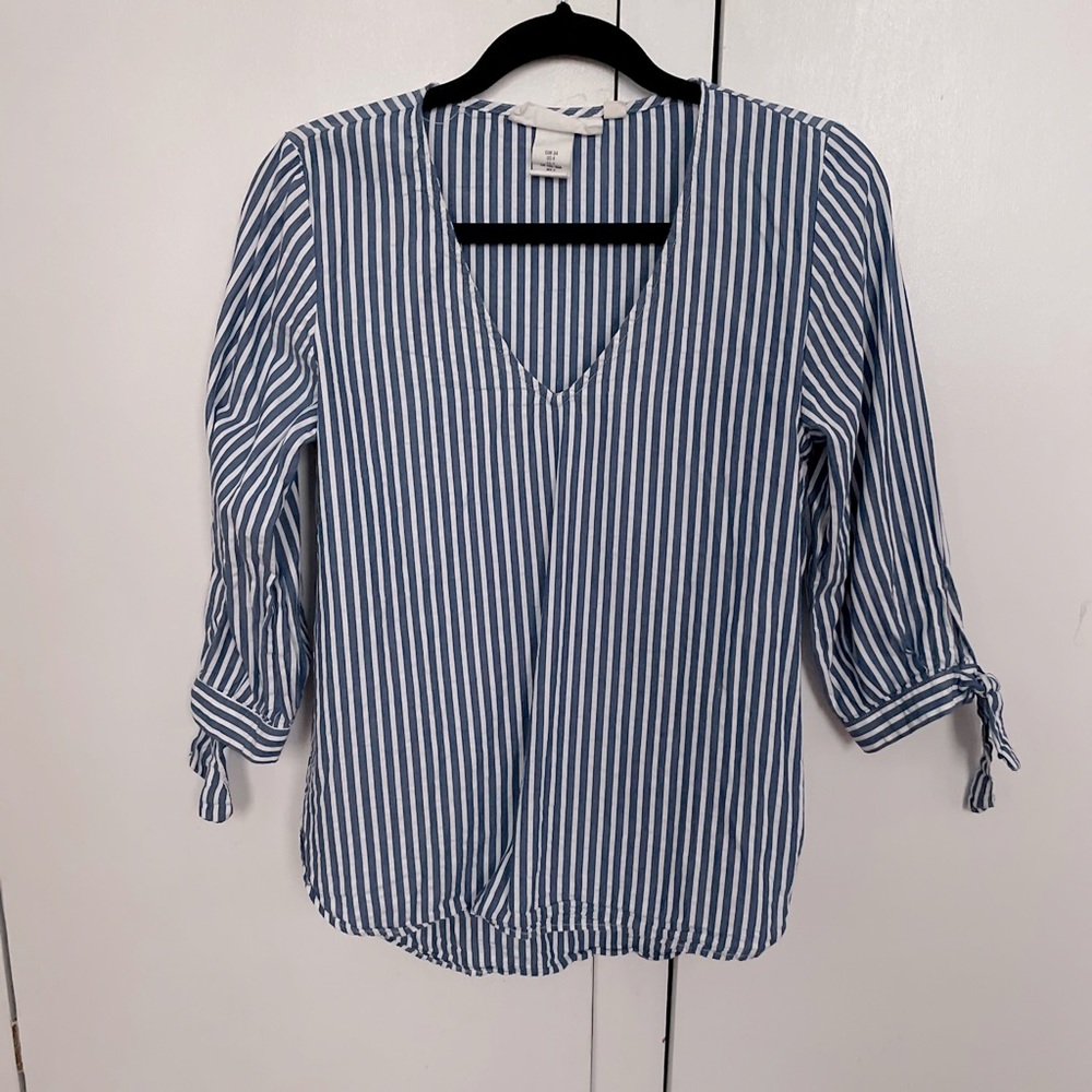 Blue and white striped tie sleeve top